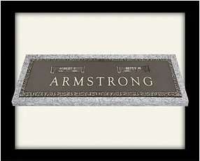 A plaque with the name armstrong in front of a white background.
