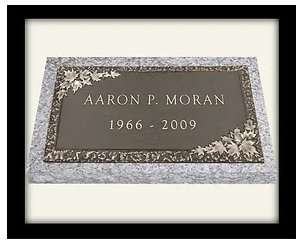 A plaque with the name aaron p. Muran and date of birth
